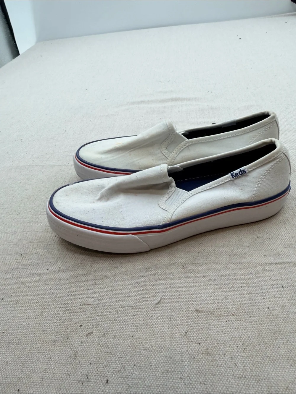 Keds White Canvas Slip-On Loafers with Red & Blue Trim